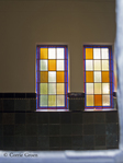 Glas-in-loodramen in gangen naar kapel.
<br/>
Corrie Groen- Pickhard, 2015-01-25